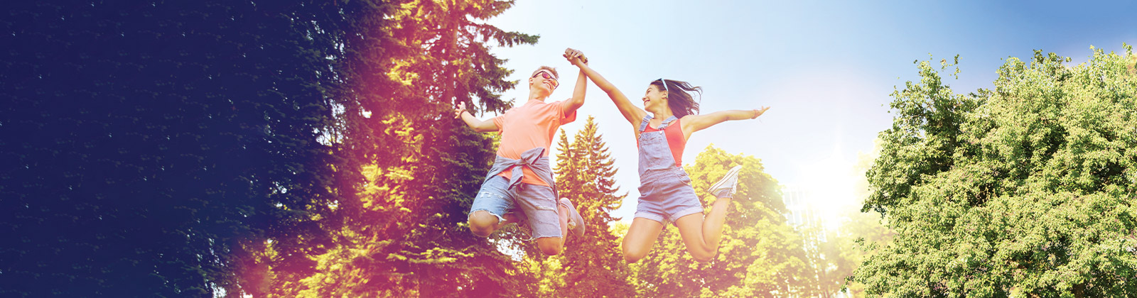 Couple Jumping in Air