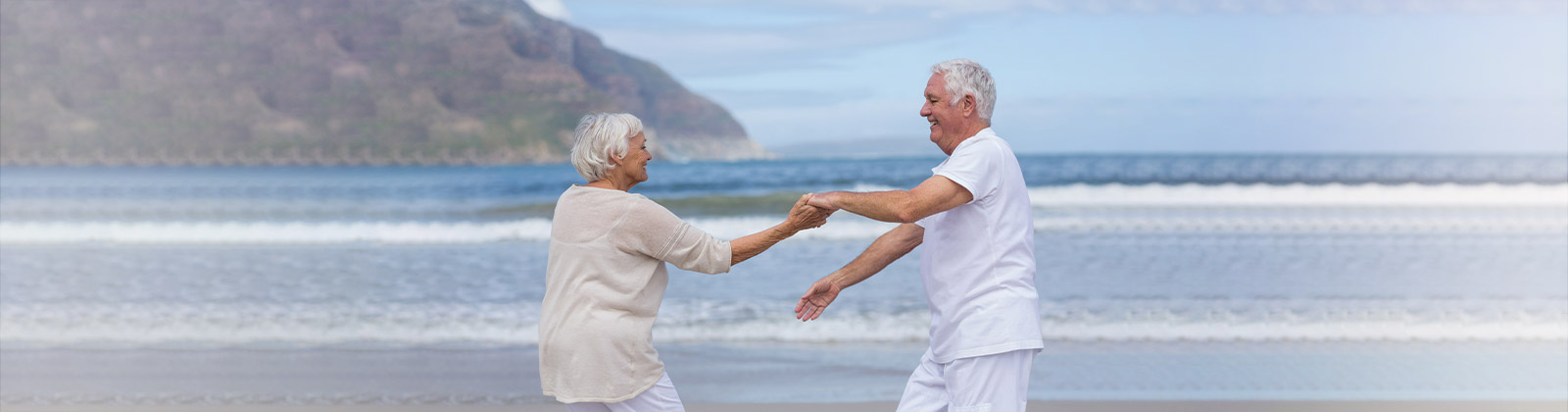 Couple dancing on a beach